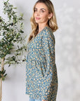Light Gray Heimish Full Size Floral Half Button Long Sleeve Blouse