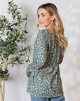 Light Gray Heimish Full Size Floral Half Button Long Sleeve Blouse