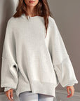 Double Take Side Slit Round Neck Long Sleeve Sweater