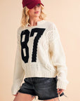 Aemi+Co Contrast Number Cable Knit Drop Shoulder Sweater