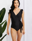 Black Marina West Swim Full Size Float On Ruffle Faux Wrap One-Piece in Black Sentient Beauty Fashions Swimwear