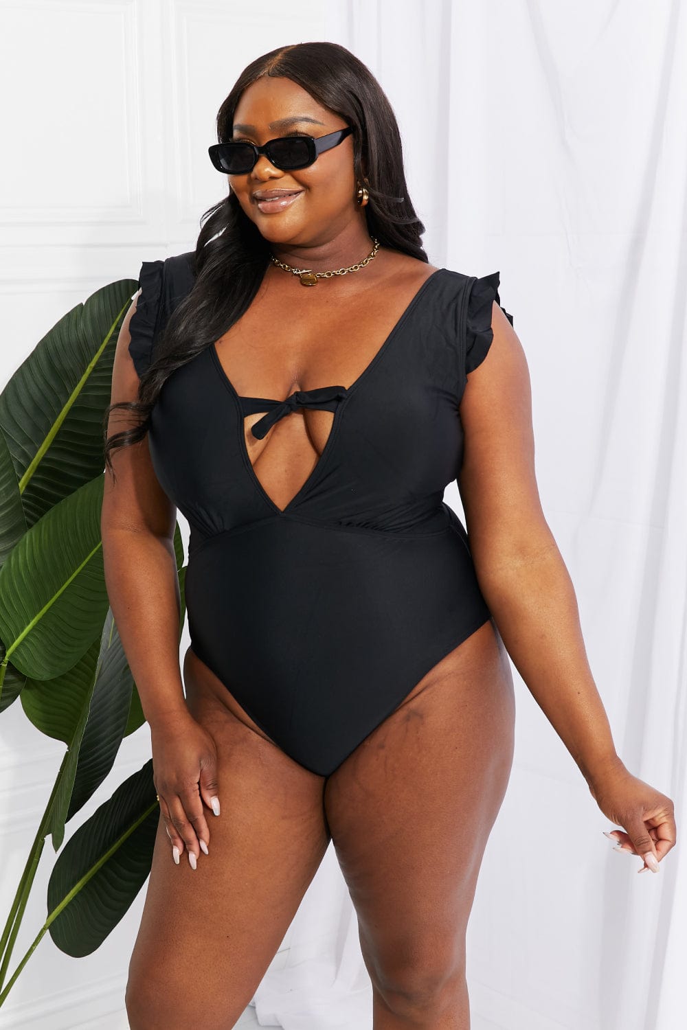 Lavender Marina West Swim Seashell Ruffle Sleeve One-Piece in Black Sentient Beauty Fashions Swimwear