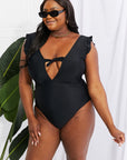 Lavender Marina West Swim Seashell Ruffle Sleeve One-Piece in Black Sentient Beauty Fashions Swimwear