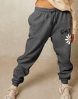 Rosy Brown Simply Love Full Size Drawstring DAISY Graphic Long Sweatpants Sentient Beauty Fashions Apparel & Accessories