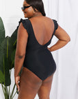 Lavender Marina West Swim Seashell Ruffle Sleeve One-Piece in Black Sentient Beauty Fashions Swimwear
