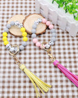 Light Gray Assorted 2-Pack Multicolored Beaded Tassel Keychain Sentient Beauty Fashions Apparel & Accessories