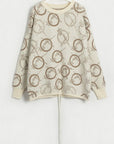 Antique White Patterned Drawstring Hem Sweater Sentient Beauty Fashions Apparel & Accessories