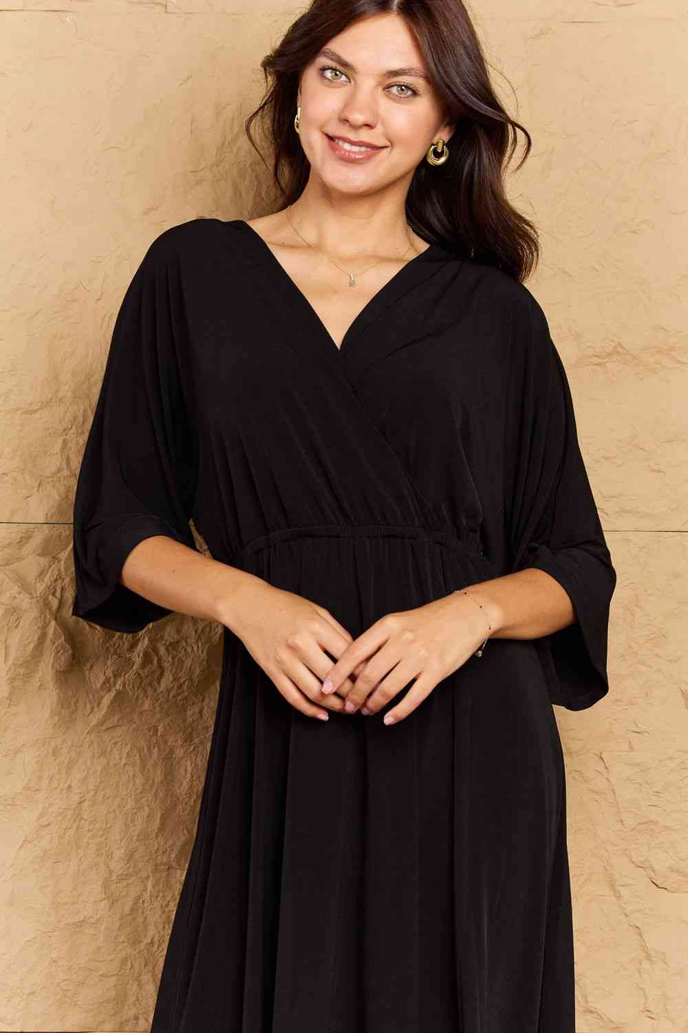 Black OneTheLand Make Your Move Solid Surplice Midi Dress